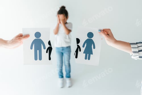 Preview: selective focus of man and woman holding ripped paper with separated family near adopted african
