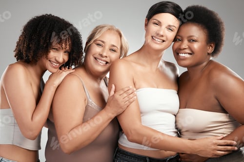Preview: Shot of a diverse group of women standing and hugging each other in the studio