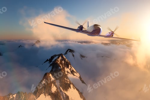 Preview: Twin Engine Airplane Flying over the Rocky Mountain Landscape
