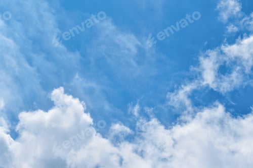 Preview: Blue sky with white fluffy clouds.