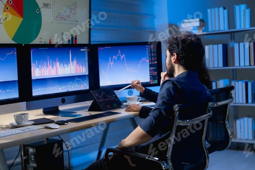 Preview: team brokers look at stock market graph on monitor compute