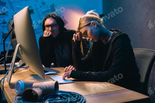 Preview: depressed couple of hackers having problem with malware development