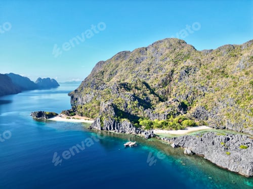 Preview: Aerial view of a green tropical landscape on a sunny day