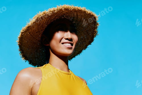 Preview: Studio woman smile beauty fashion portrait swimsuit hat eyes yellow lady trendy summer female