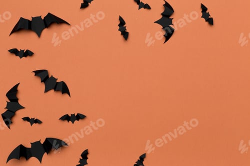 Preview: halloween and decoration concept - paper bats flying