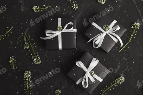 Preview: Elegant Wrapped Gifts With Delicate White Ribbon