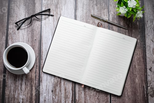 Preview: Empty notebook coffee glasses pen top view wooden table. Copy space.