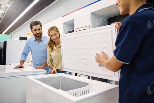 Preview: A couple is exploring freezer options with help from a knowledgeable sales associate