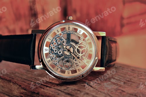 Preview: Closeup of elegant men watch with a visible mechanism
