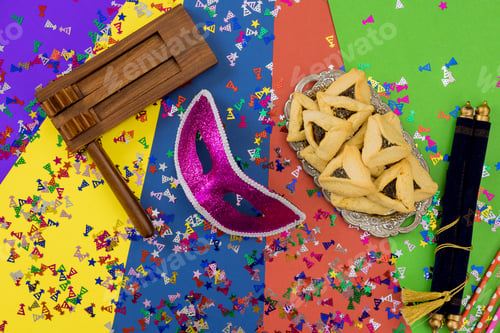 Preview: The noisemaker, or grogger, is a traditional Purim symbol used to drown out the name of Haman, a