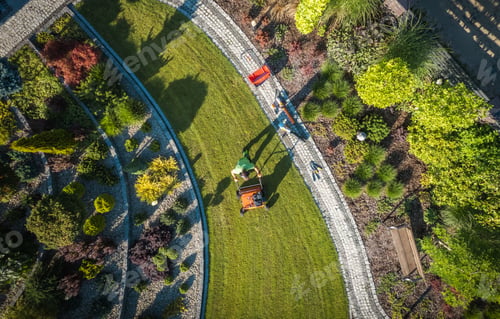 Preview: Landscaping Worker Lawn Aerating Using Gasoline Aerator