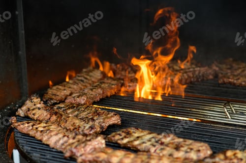 Preview: american bbq ribs cooking on grill