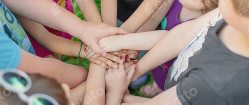 Preview: Children's hands together, street games. Selective focus.