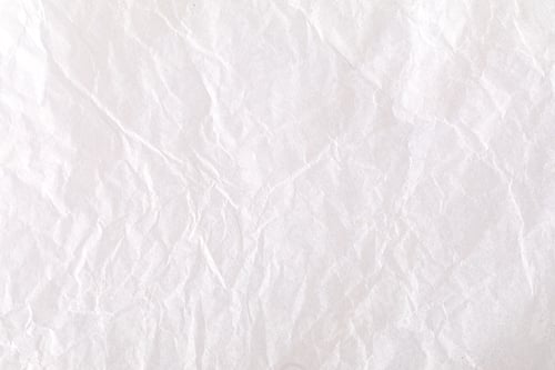 Preview: Crumpled white paper creates textured background ideal for design projects