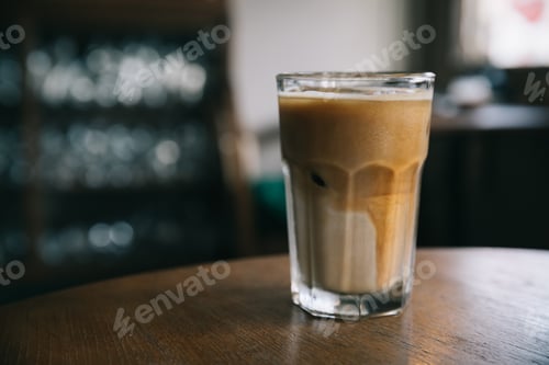 Preview: Cappuccino Or Latte Ice Coffee Made From Milk On The Wood Table In Coffee Shop