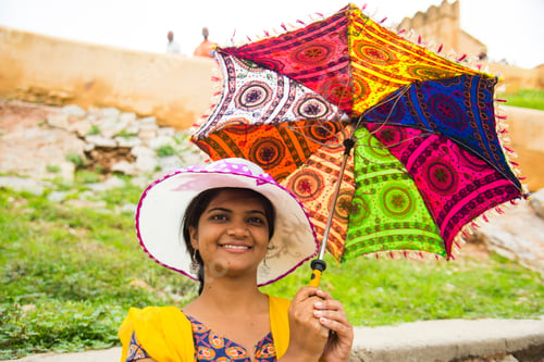 Preview: Young female tourist at The Amber Fort, India.