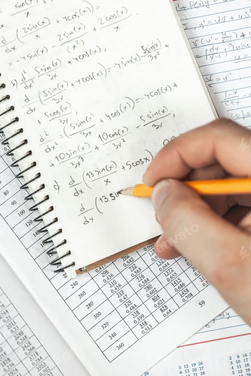Preview: Math formulas are written in pencil in a notebook holding man in