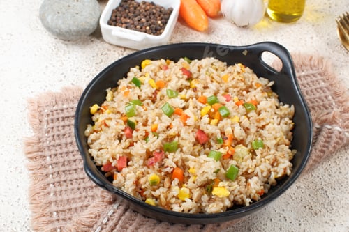Preview: Fried rice with vegetables in a plate, Asian food