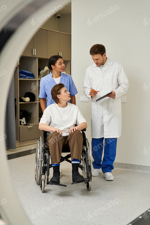 Preview: Healthcare team preparing a patient for an MRI scan in a modern hospital setting