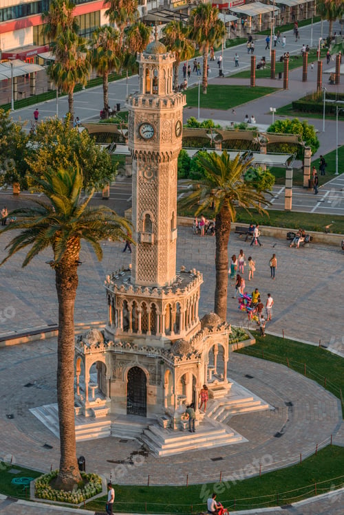 Preview: Konak Square street view with old clock tower (Saat Kulesi) at sunset. Turkey, izmir
