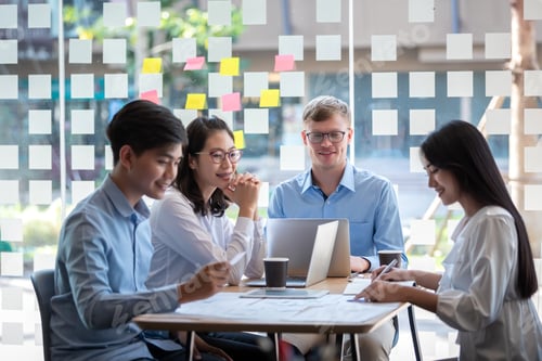 Preview: Group of young asian business people together share opinions and propose new marketing