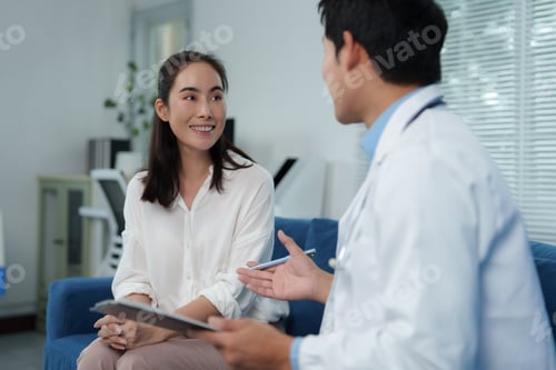 Preview: Woman Consults Doctor in Bright Home Setting
