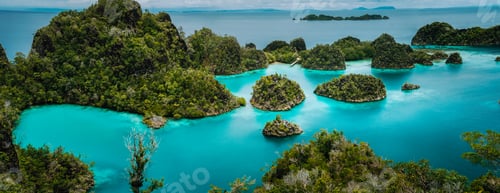 Preview: Panoramic view Pianemo Islands, Blue Lagoon with Green lush karst lime stone Rockes, Raja Ampat