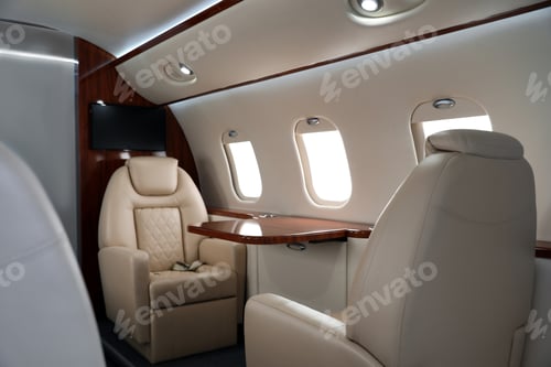 Preview: Airplane cabin with comfortable seats and table