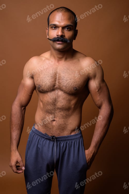 Preview: Portrait of muscular Indian man with mustache shirtless