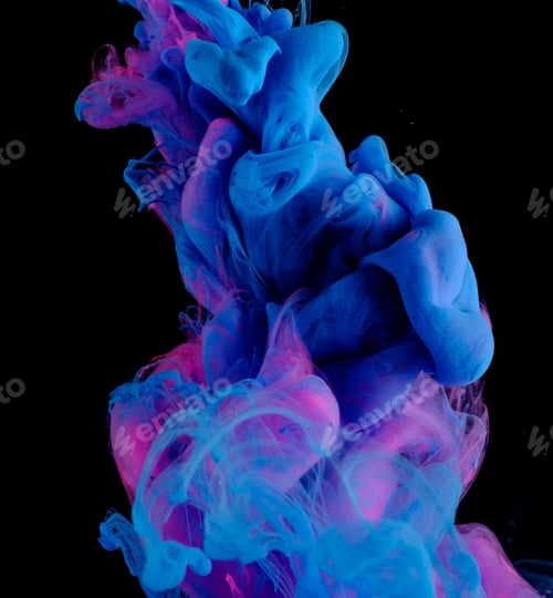 Preview: Blue pink clouds of ink in liquid isolated on black