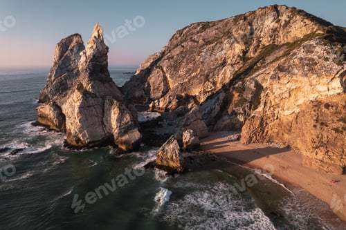 Preview: Beach and sea near rocks