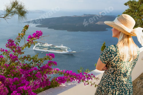 Preview: Attractive Female Tourist Admiring the View of the Cruise Ship Off the Coast of Santorini Greece.