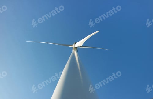 Preview: Windmill in the blue sky. Sustainable energy, wind energy.