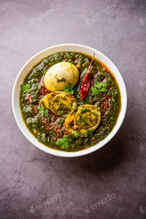 Preview: Spinach egg curry is an Indian non vegetarian dish made using palak gravy with eggs