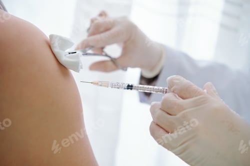 Preview: Nurse vaccinating patient