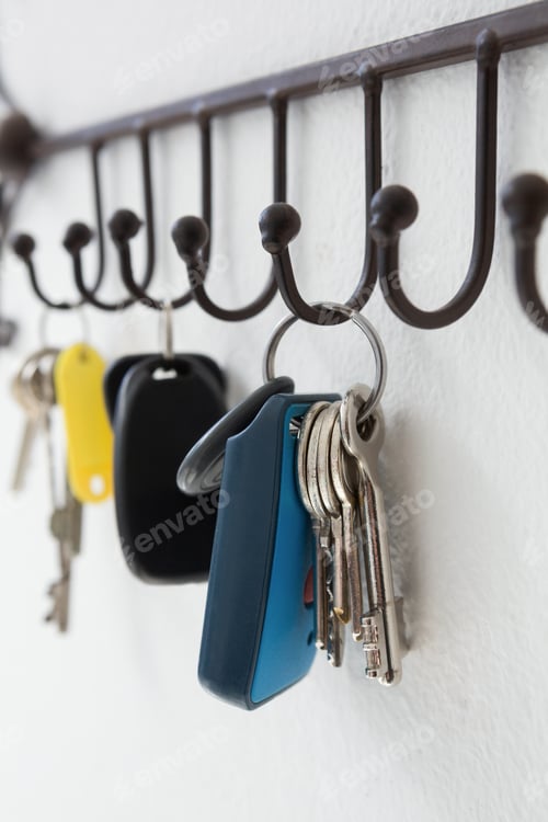 Preview: Close-up of various keys hanging on hook