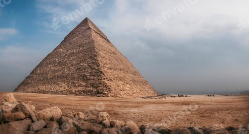 Preview: Great Pyramid of Giza under a partly cloudy sky, showcasing its ancient architecture