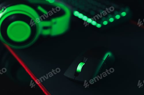 Preview: Gaming wireless accessories with green backlight on black mat