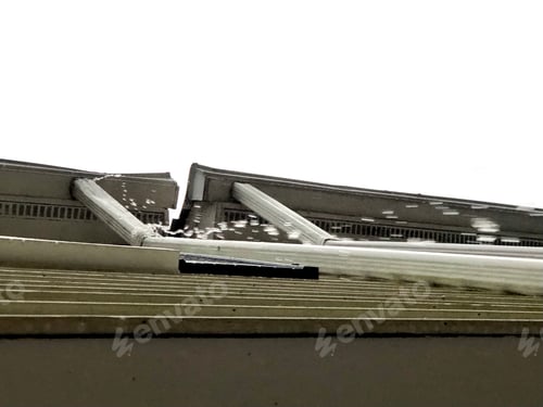 Preview: Rain overflowing gutters and downspout