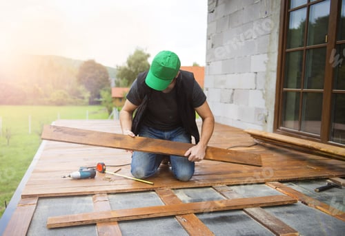 Preview: Handyman installing wooden flooring