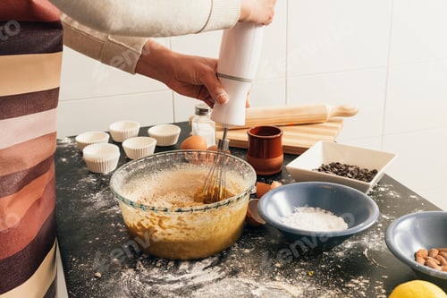 Preview: Beautiful woman Preparing Cookies And Muffins