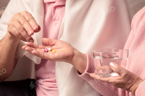 Preview: Elderly man taking the medicines