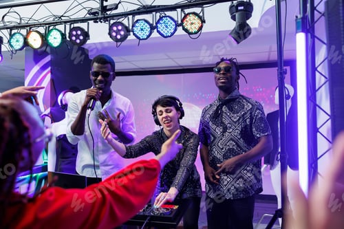 Preview: Musicians group playing on club stage