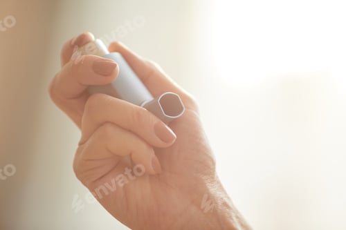 Preview: Hand Holding Inhaler Close Up