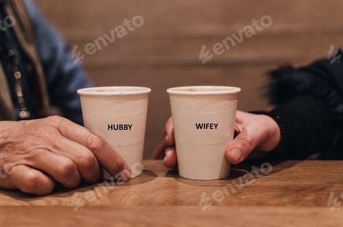 Preview: Affectionate Couple Celebrating Anniversary with Coffee Drinks