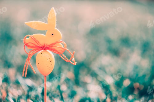 Preview: Easter background concept with yellow bunny figure