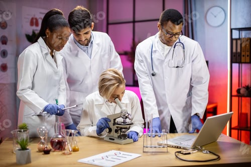 Preview: Modern medical research laboratory: portrait of group young scientists