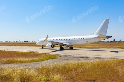Preview: Big passenger airplane drives along the runway in airport
