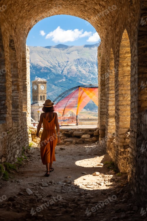 Preview: A woman walking in the arches of the fortress of the Ottoman castle of Gjirokaster or Gjirokastra