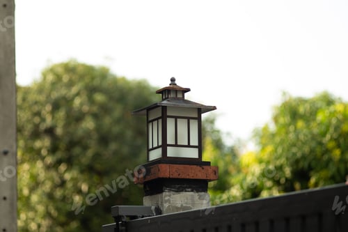 Preview: Japanese Style Lantern on Garden Gate in Natural Daylight